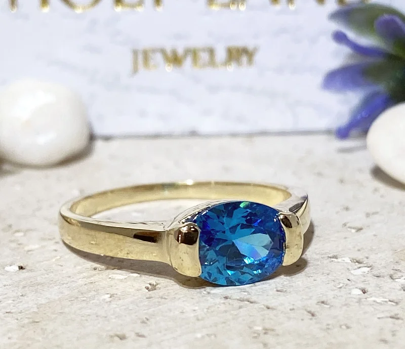 Multi - Gemstone Rings with a Rainbow of ColorsBlue Topaz Ring - December Birthstone - Oval Blue Topaz Gemstone Simple Stacking Ring