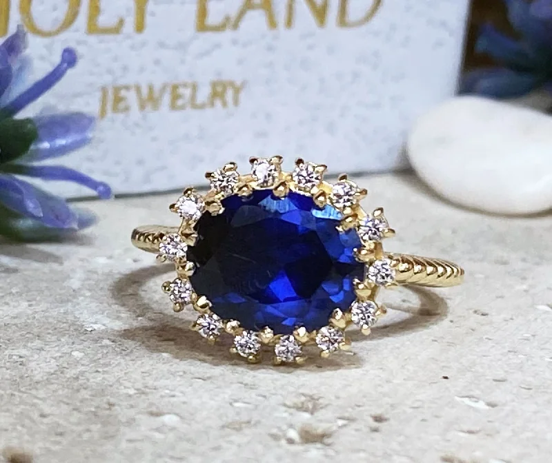 Multi - Gemstone Rings with a Rainbow of ColorsBlue Sapphire Ring - September Birthstone - Engagement Ring with Oval Blue Sapphire Gemstone and Clear Quartz Halo