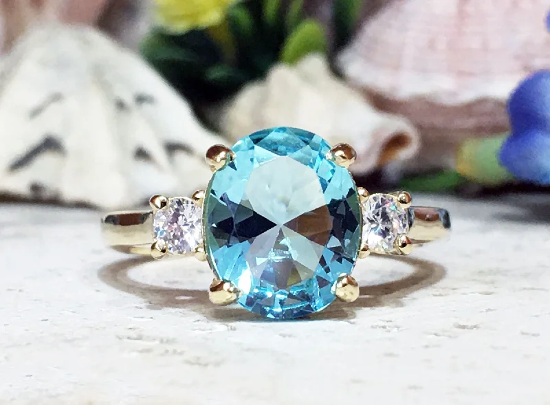 Amethyst Gemstone Rings in a Vintage - Style SettingAquamarine Ring - March Birthstone - Statement Engagement Ring with Oval Aquamarine Gemstone and Clear Quartz Accents