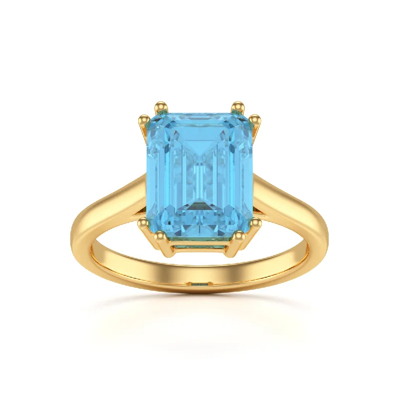 Emerald Gemstone Rings with Filigree - Bordered SettingsEmerald Cut Blue Topaz Solitaire Dress Ring