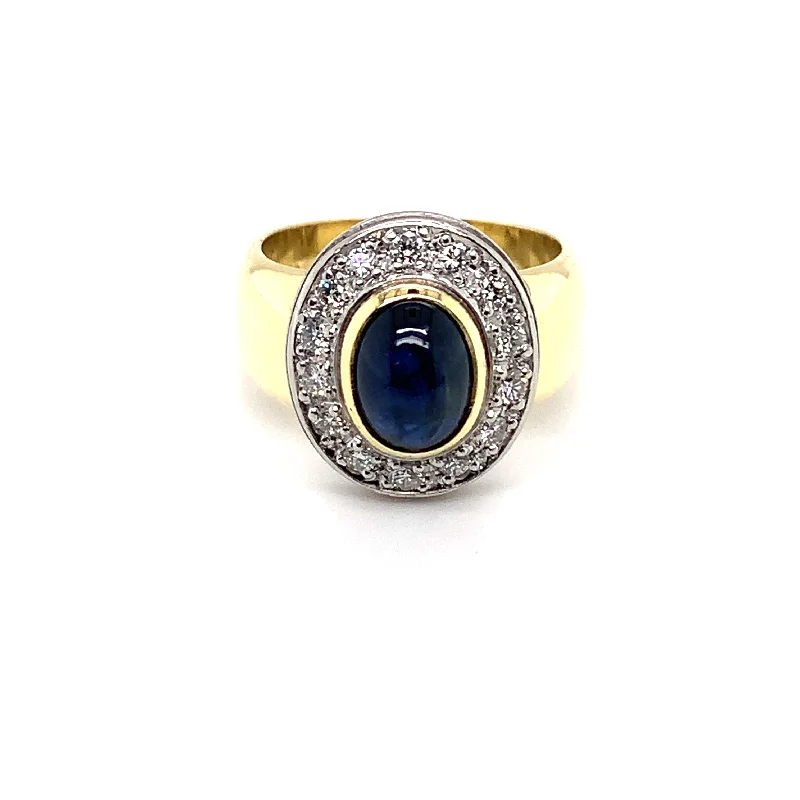 Amethyst Gemstone Rings in a Vintage - Style SettingVintage Oval Blue Cabochon Sapphire and Diamond Halo Ring in 18ct Yellow Gold