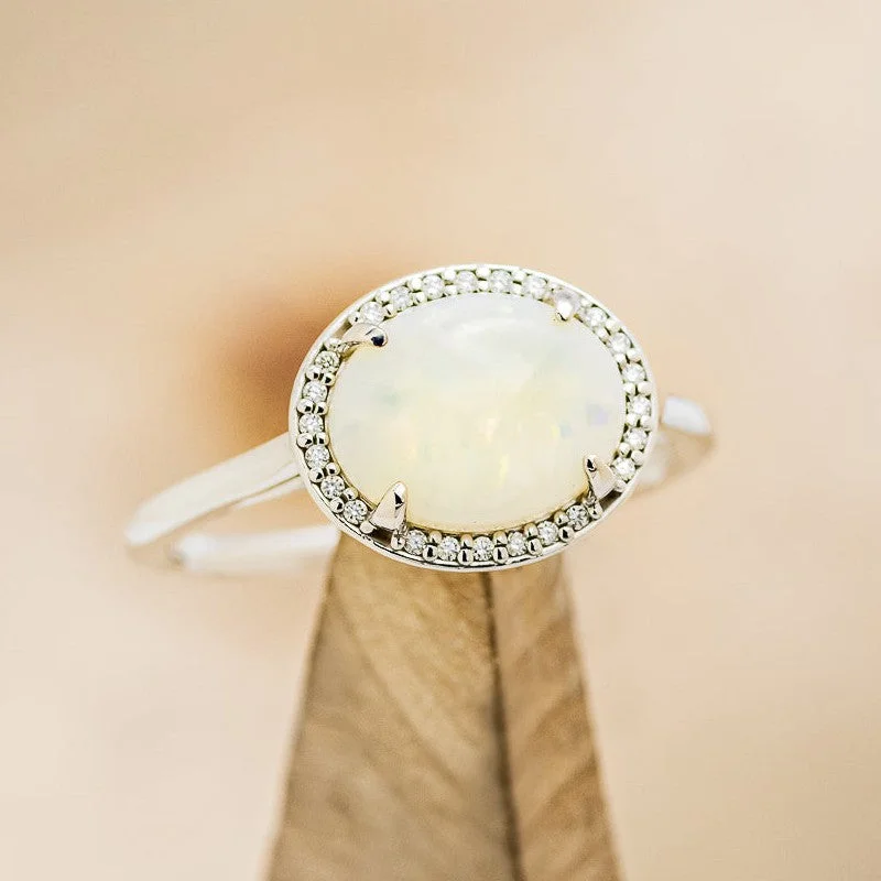 "GALE" - OVAL OPAL ENGAGEMENT RING WITH DIAMOND HALO