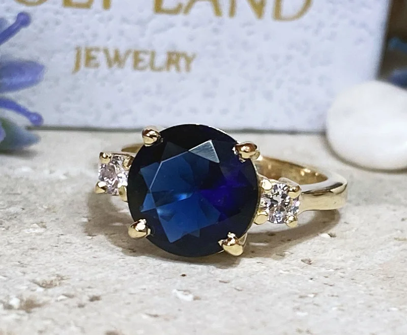 Multi - Gemstone Rings with a Rainbow of ColorsBlue Sapphire Ring - September Birthstone - Statement Engagement Ring with Round Blue Sapphire Gemstone and Clear Quartz Accents