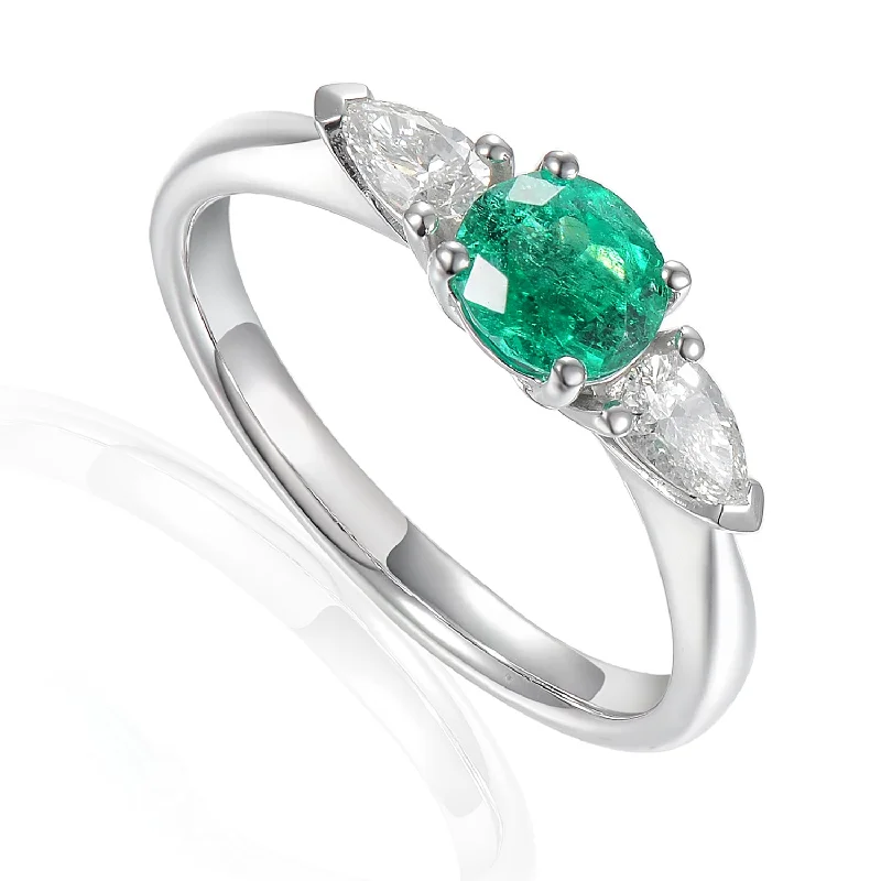 Custom - Designed Diamond Rings to Reflect Your PersonalityPlatinum 0.62ct Round Brilliant Cut Emerald And 0.30ct Pear Cut Diamond Three Stone Ring