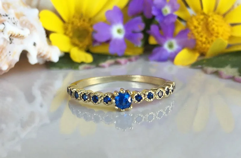 Sapphire Gemstone Rings in a Cathedral SettingBlue Sapphire Ring - September Birthstone - Delicate Stacking Ring with Thirteen Round Blue Sapphire Gemstones