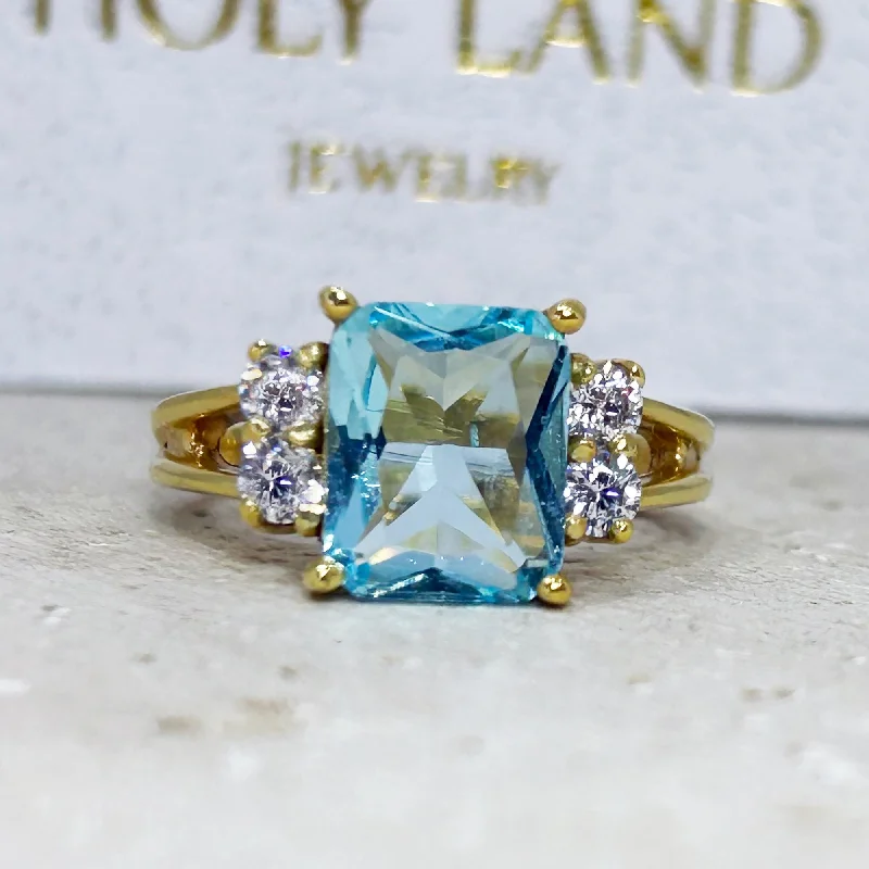 Sapphire Gemstone Rings in a Cathedral SettingAquamarine Ring - March Birthstone - Statement Engagement Ring with Octagon Aquamarine Gemstone and Clear Quartz Accents