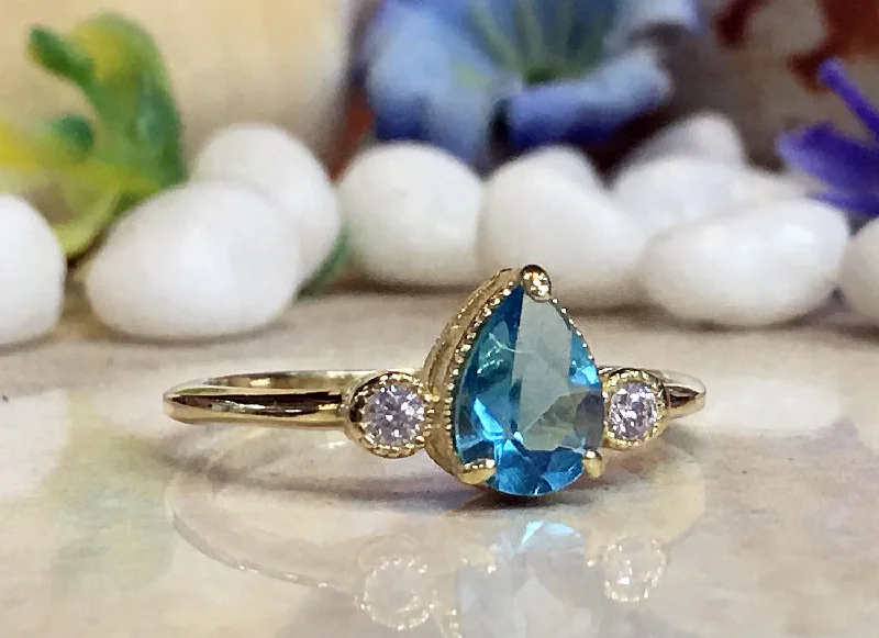 Amethyst Gemstone Rings in a Vintage - Style SettingBlue Topaz Ring - December Birthstone - Tiny Delicate Ring with Pear-Shaped Blue Topaz Gemstone and Clear Quartz Accents