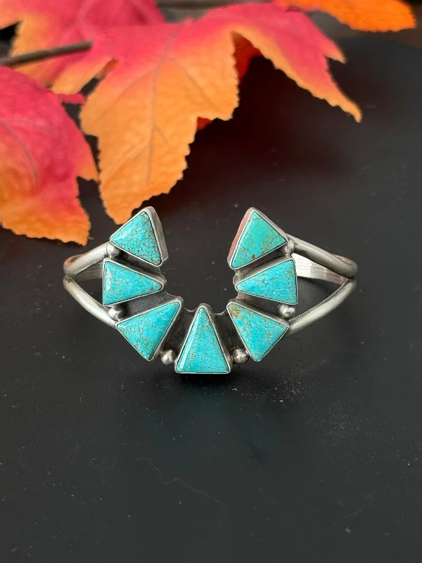 Stackable Cuff Bracelets for a Layered LookDonovan Skeets #8 Turquoise & Sterling Silver Cluster Naja Cuff Bracelet