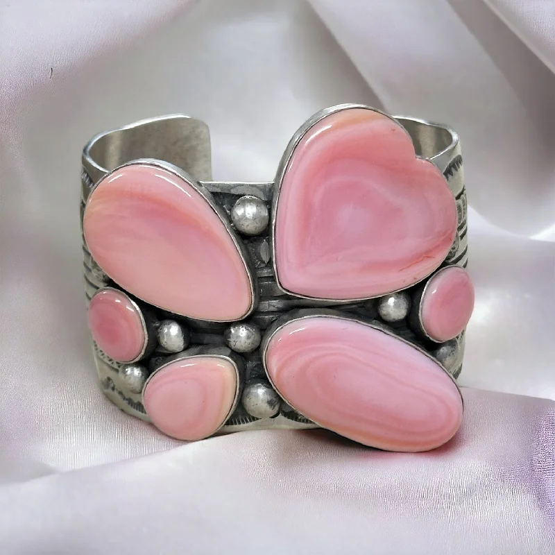 Cuff Bracelets with Hidden Clasps for a Seamless LookLeRoy James Pink Conch & Sterling Silver Cuff Bracelet