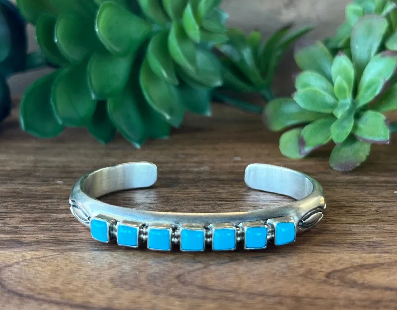 Tribal - Inspired Cuff Bracelets with Traditional PatternsT. Yazzie Natural Sleeping Beauty Turquoise & Sterling Silver Cuff Bracelet