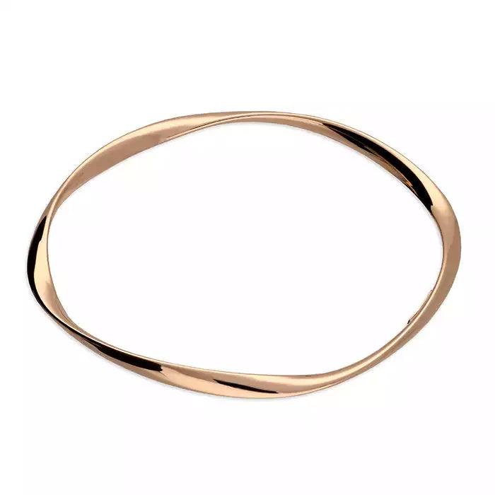 Stackable Bangle Sets for a Trendy LookRose Gold Twist Bangle