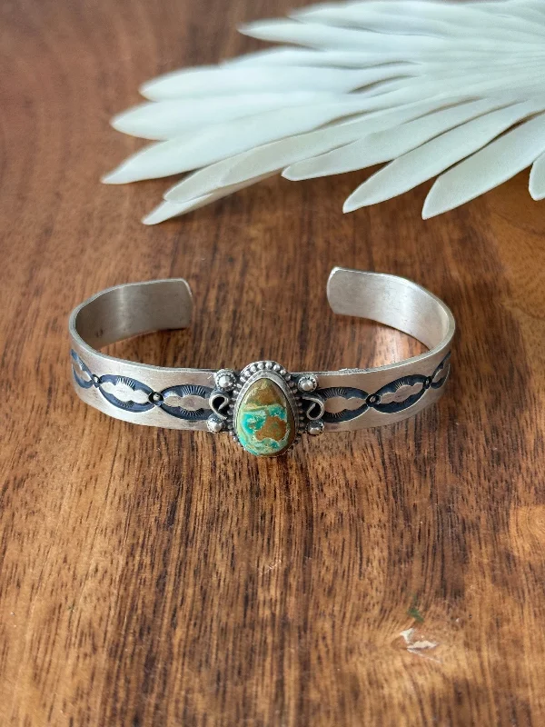 Cuff Bracelets with Hidden Clasps for a Seamless LookNavajo Made Royston Turquoise & Sterling Silver Cuff Bracelet