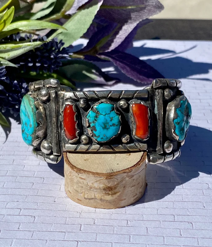 Cuff Bracelets with a Hinged Design for Added FlexibilityVintage Navajo Made Kingman Turquoise & Coral Sterling Silver Cuff Bracelet