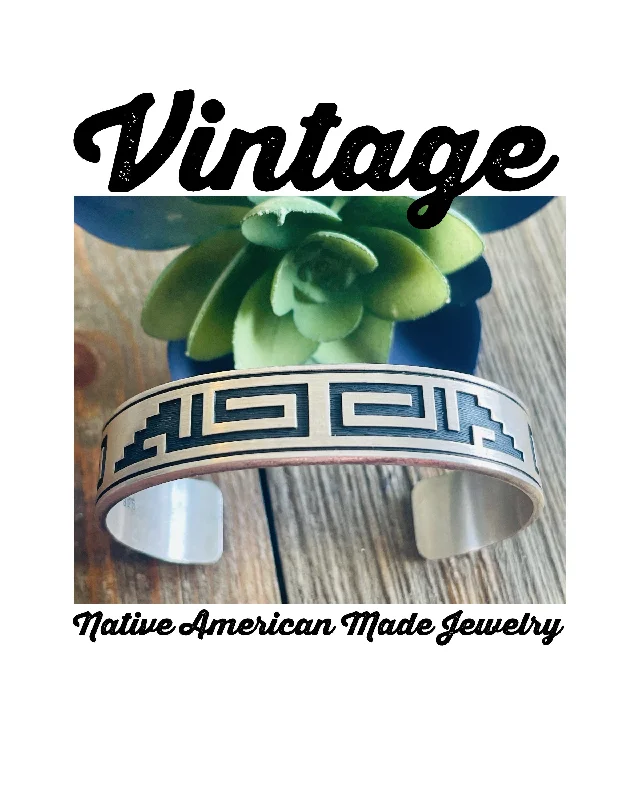 Cuff Bracelets with a Hinged Design for Added FlexibilityVintage Hopi Sterling Silver Overlay Cuff Bracelet