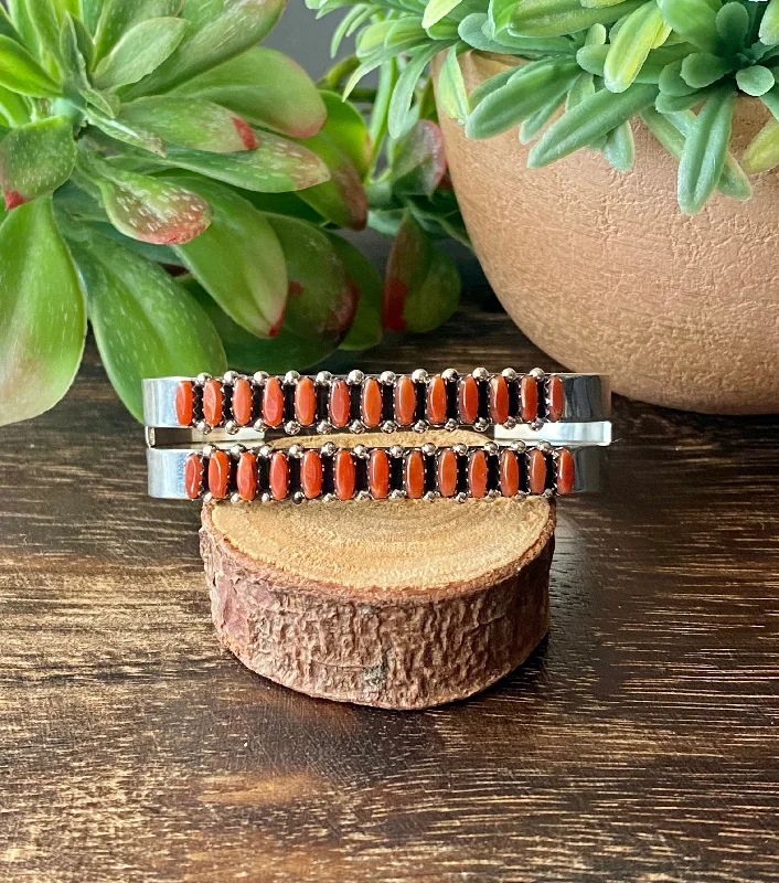 Cuff Bracelets with a Hinged Design for Added FlexibilityZuni Made Coral & Sterling Silver Needlepoint Cuff Bracelet