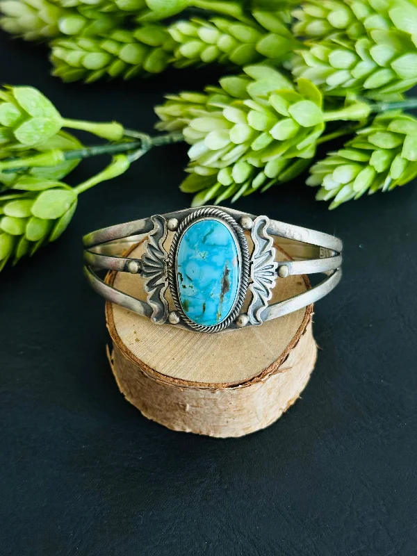 Cuff Bracelets with Hidden Clasps for a Seamless LookMark Yazzie High Grade Turquoise and Sterling Silver Cuff Bracelet