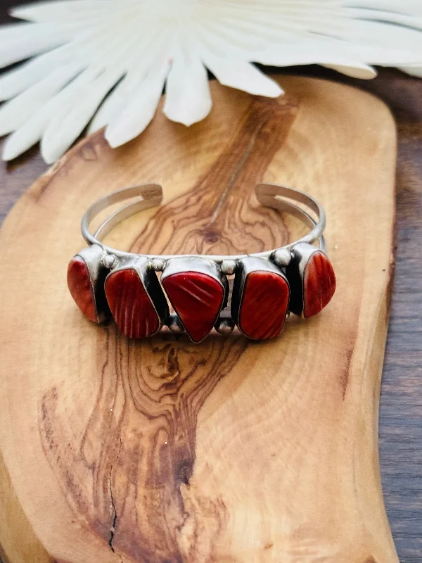 Tribal - Inspired Cuff Bracelets with Traditional PatternsAugustine Largo Red Spiny Oyster & Sterling Silver Cuff Bracelet