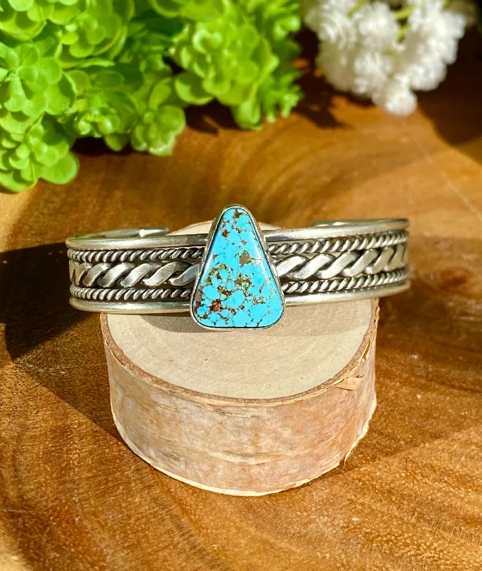 Tribal - Inspired Cuff Bracelets with Traditional PatternsNavajo Made Kingman Turquoise & Sterling Silver Cuff Bracelet