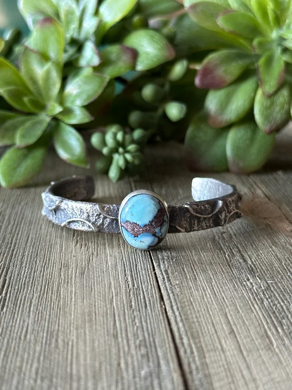 Leather Cuff Bracelets with Metal Stud EmbellishmentsNavajo Made Golden Hills Turquoise & Sterling Silver Tufa Cast Cuff Bracelet