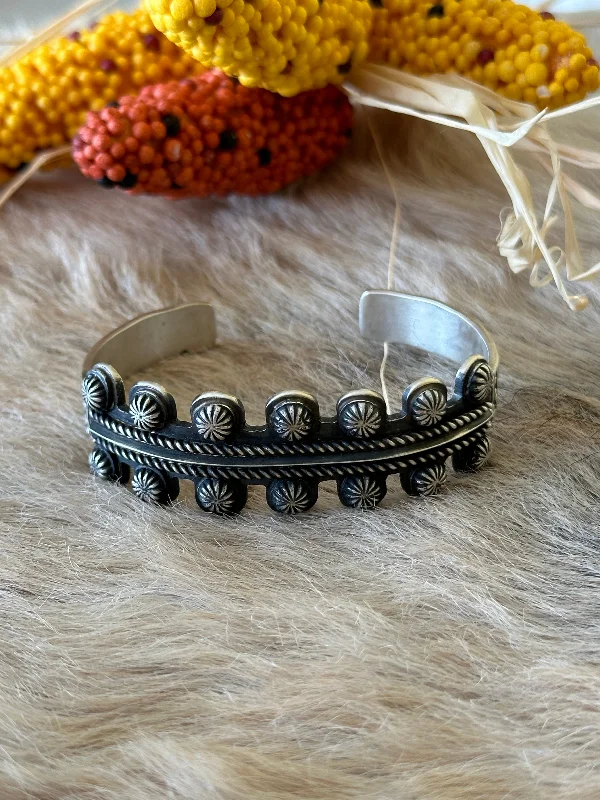 Vintage - Inspired Cuff Bracelets with Floral MotifsMartha Cayarineto Sterling Silver Cuff Bracelet