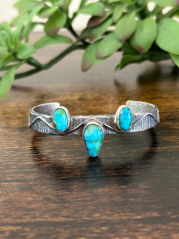 Minimalist Cuff Bracelets in Sleek Stainless SteelNavajo Made Sonoran Mountain Turquoise & Sterling Silver Tufa Cast Cuff Bracelet