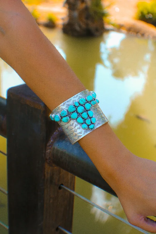 Adjustable Cuff Bracelets for a Perfect FitNavajo Made Kingman Turquoise & Sterling Silver Bull Cluster Cuff Bracelet