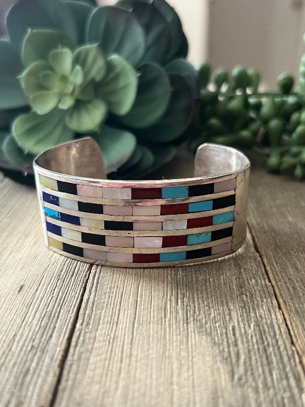 Vintage - Inspired Cuff Bracelets with Floral MotifsZuni Made Multi Stone & Sterling Silver Inlay Cuff Bracelet