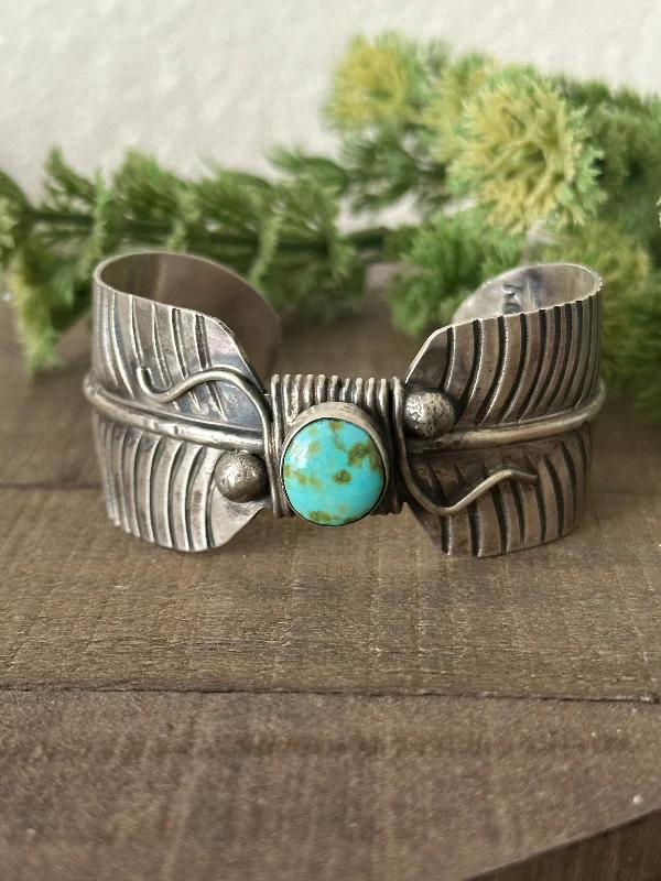 Gemstone - Inlaid Cuff Bracelets with Sapphires and RubiesNavajo Made Sonoran Gold Turquoise and Sterling Silver Cuff Bracelet