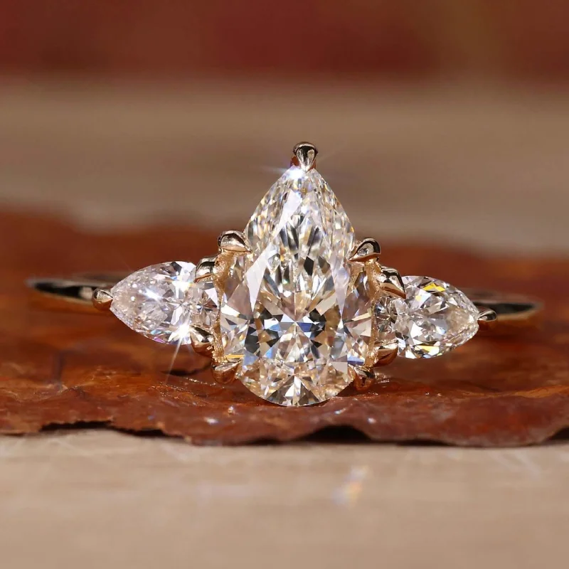 Pear Cut Three Stone Lab Grown Diamond Engagement Ring