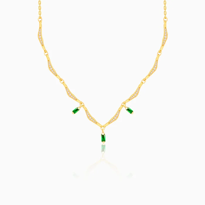 Nature - Inspired Pendant Necklaces with Leaf or Flower DesignsGolden Emerald Tranquility Necklace