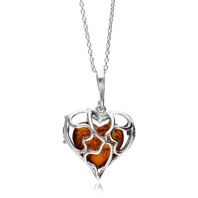 Crystal - Embellished Pendant Necklaces for a Glamorous LookSterling Silver Amber Caged Heart Pendant