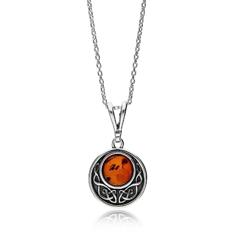 Nature - Inspired Pendant Necklaces with Leaf or Flower DesignsSterling Silver Amber Oxidised Celtic Disc Pendant