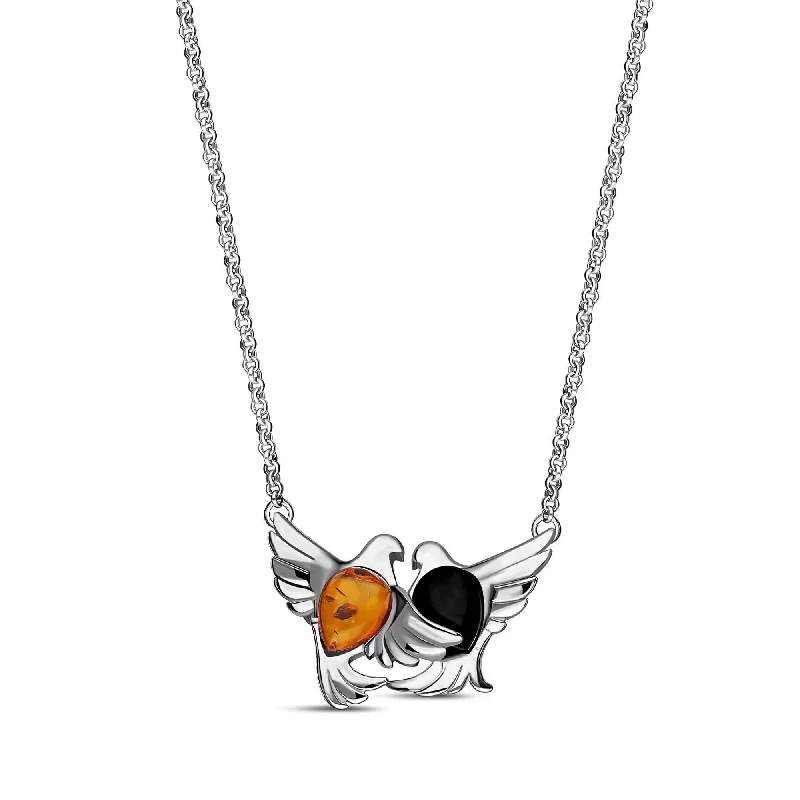 Nature - Inspired Pendant Necklaces with Leaf or Flower DesignsSterling Silver Whitby Jet & Amber Entwined Dove Necklace